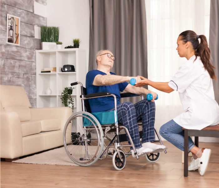imgi_2_aged-person-suffering-arms-pain-sitting-wheelchair-training-with-dumbbells-1